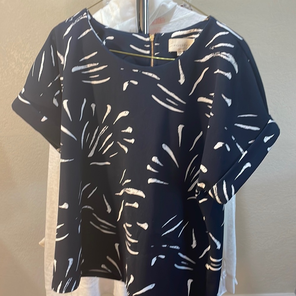Woman’s blue and white top
